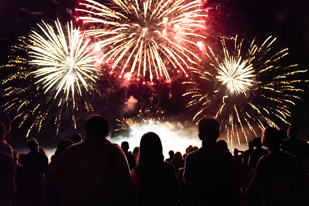 Crowd watching fireworks and celebrating new year eve bd
